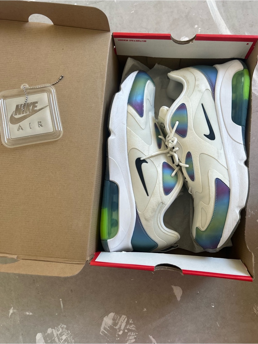 Nike White Sneakers with Iridescent Blue-Green Accents